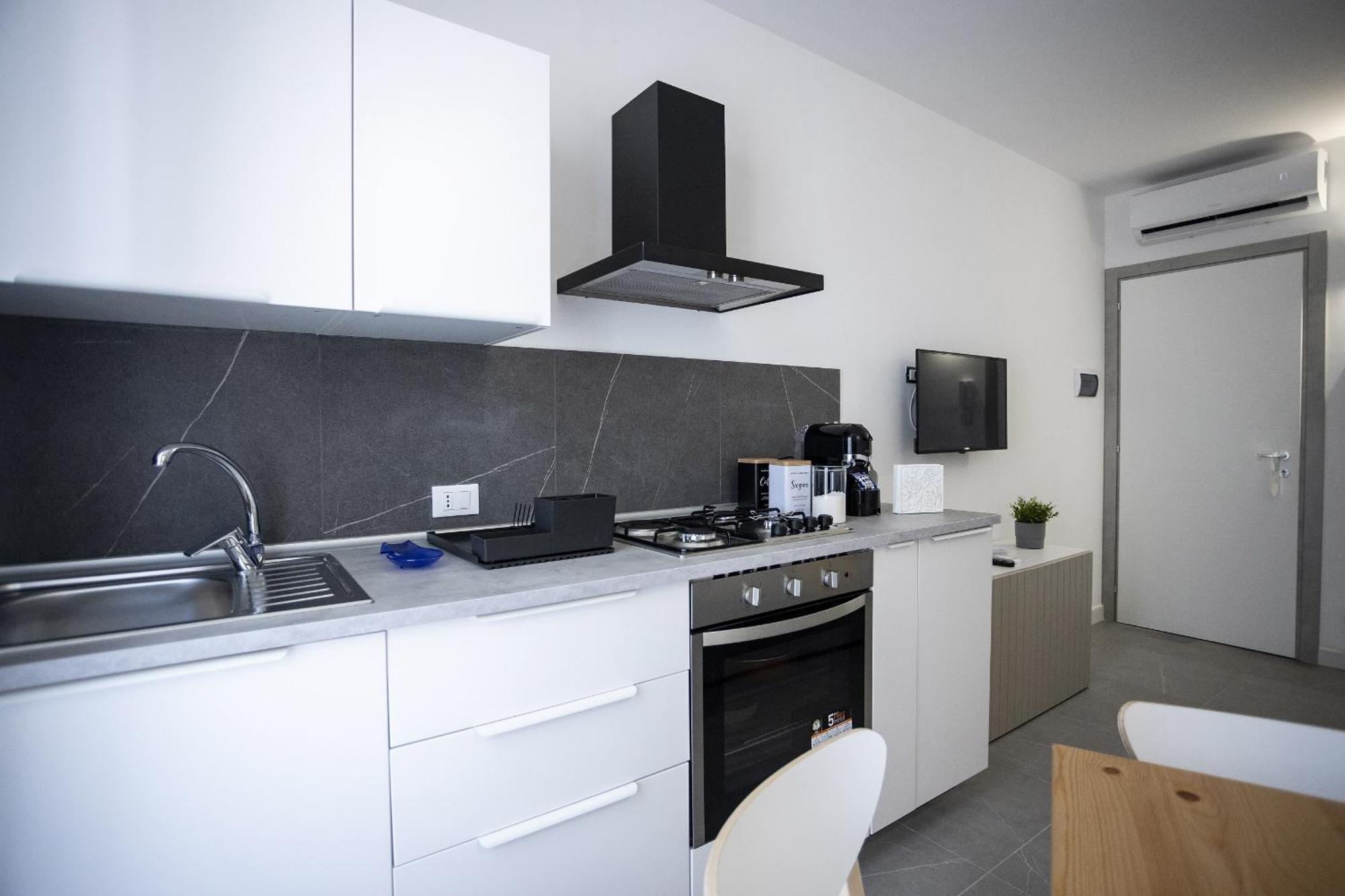 Acquaro Suite Apartments San Vito Lo Capo Szoba fotó